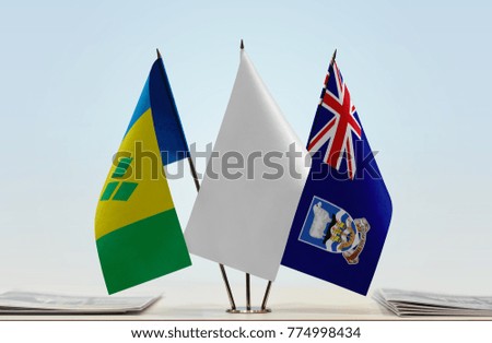 Flags of Saint Vincent and the Grenadines and Falkland Islands with a white flag in the middle
