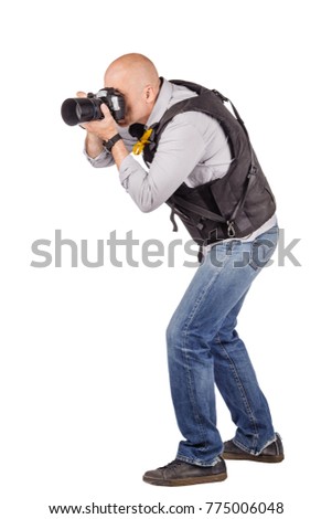 photographer with a professional camera. Isolated on white background