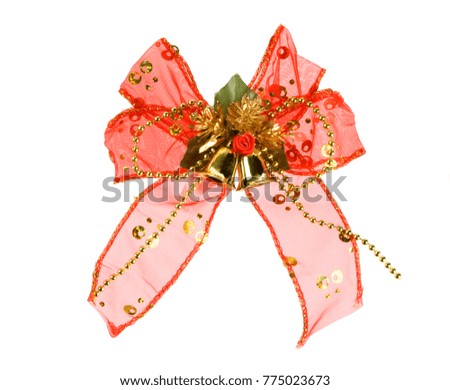 Red christmas bow on white background.