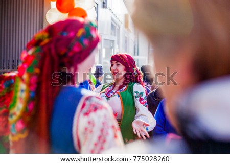 Beautiful girls conduct contests with the audience Royalty-Free Stock Photo #775028260