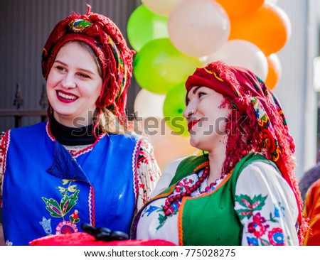 Girls in national dress show the show Royalty-Free Stock Photo #775028275