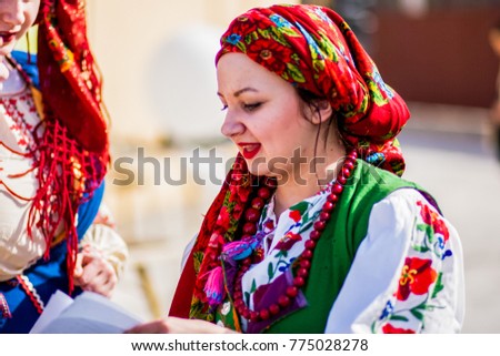 Girls in national dress show the show Royalty-Free Stock Photo #775028278
