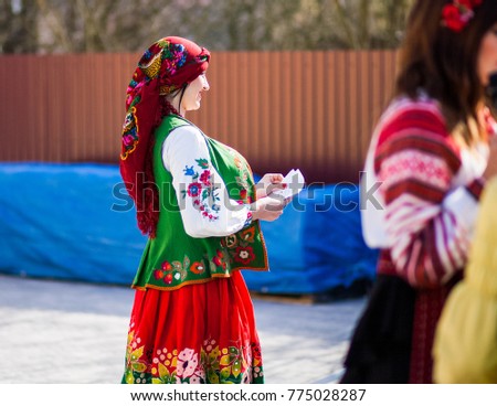 Girls in national dress show the show Royalty-Free Stock Photo #775028287