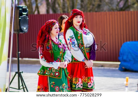 Girls in national dress show the show Royalty-Free Stock Photo #775028299