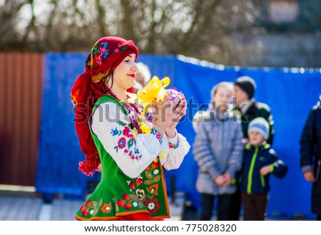 Girls in national dress show the show Royalty-Free Stock Photo #775028320