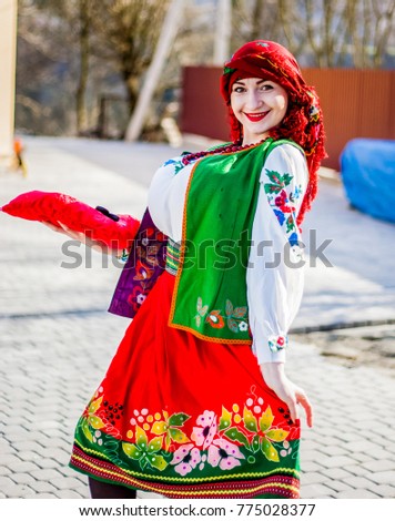 Girls in national dress show the show Royalty-Free Stock Photo #775028377