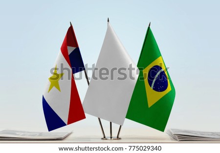 Flags of Saba and Brazil with a white flag in the middle