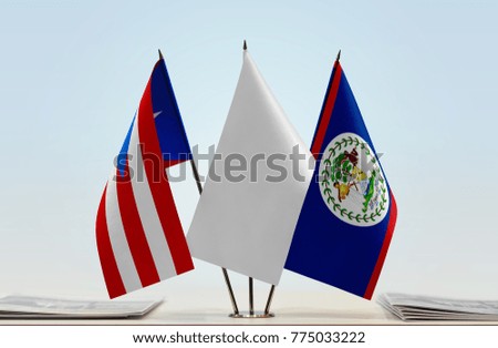 Flags of Puerto Rico and Belize with a white flag in the middle