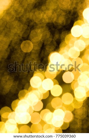 Abstract, colorful, blurry christmas background. Glowing and sparkling lights during night.