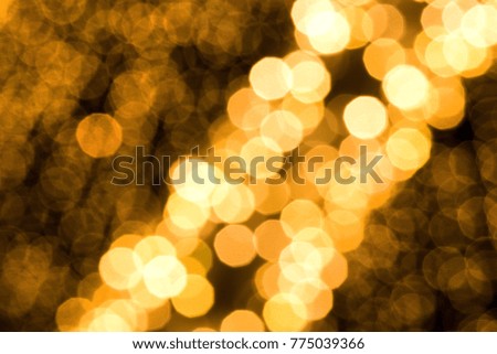 Abstract, colorful, blurry christmas background. Glowing and sparkling lights during night.