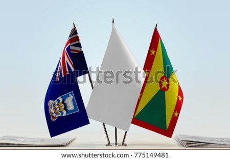 Flags of Falkland Islands and Grenada with a white flag in the middle
