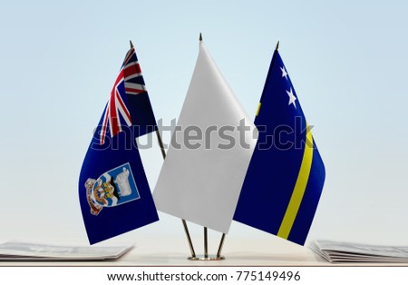 Flags of Falkland Islands and Curaçao with a white flag in the middle