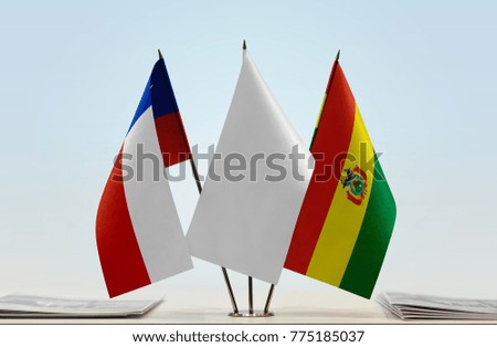 Flags of Chile and Bolivia with a white flag in the middle