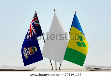 Flags of Cayman Islands and Saint Vincent and the Grenadines with a white flag in the middle