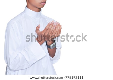 Muslim kids with full Islamic dress praying on the stage.Muslim kids lead a pray session on the stage using microphone isolated over white background.