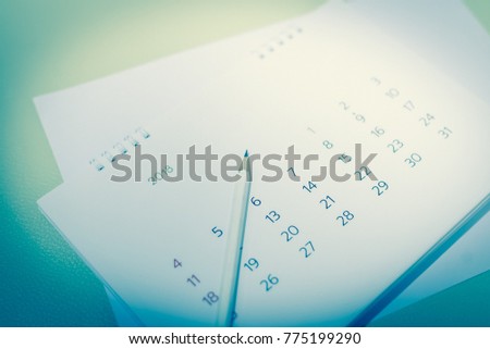 Blurred calendar on blue tone Royalty-Free Stock Photo #775199290