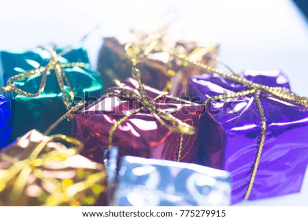 Christmas party celebration presents gift wrapped miniatures.