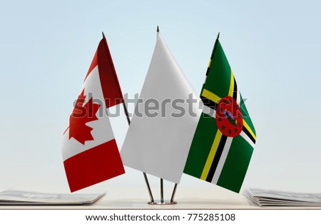 Flags of Canada and Dominica with a white flag in the middle