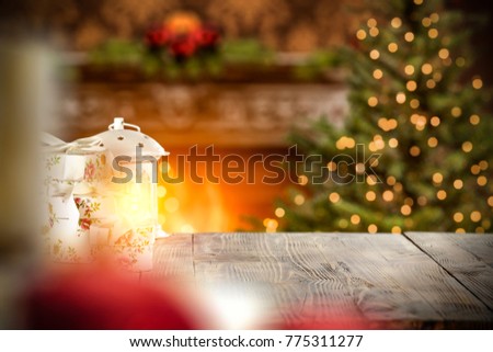 Christmas table and home interior with fireplace and x mas tree. 