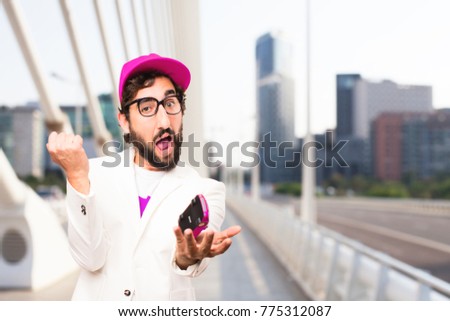 young crazy businessman with a red car toy