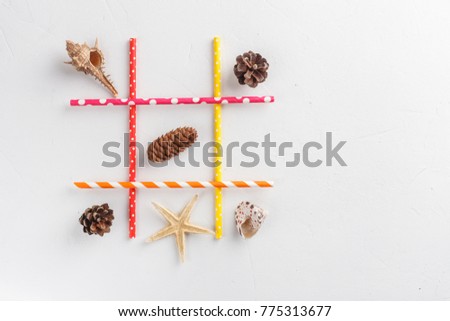 Game TIC TAC toe. Winter wins over summer. Seasonal conception. Top view, flat lay with copy space for text