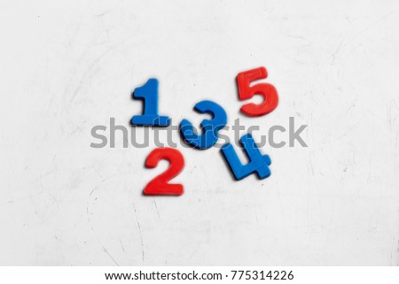 Learning colorful numbers on a blackboard. Background and textures. 