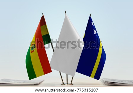 Flags of Bolivia and Curaçao with a white flag in the middle