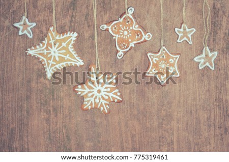 Christmas cookies in the shape of a star on wooden background 