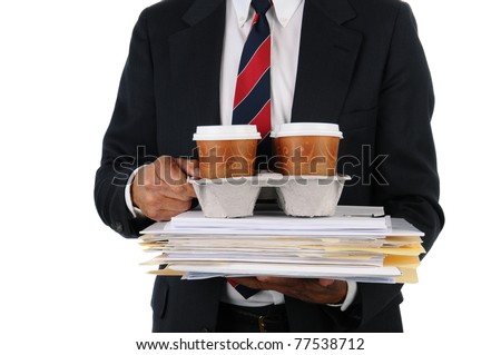 Business man holding a take out tray of disposable coffee cups on top of a stack of files. Closeup in Horizontal format isolated on white showing torso only.