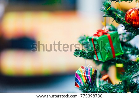 christmas tree with colorful balls and gift boxes 