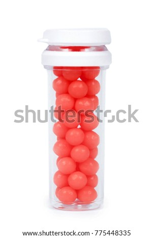 Medicine bottle with vitamins in hand isolated on white background, transparent container with pills, 