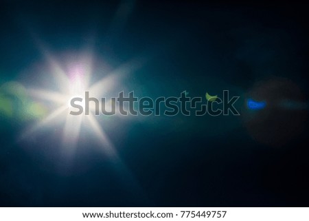 Solar Eclipse of August 21st, 2017 with lens flare and moon reflection.
