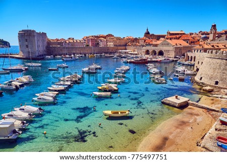 Bay with boats in dubrovnik. a lot of boats on the blue water. dubrovnik, croatia. Royalty-Free Stock Photo #775497751