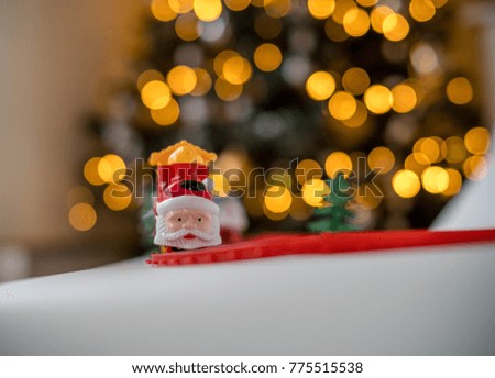 Christmas toy train for kids gift, lights background