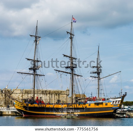 Old pirate frigate and boats in St-Malo, France