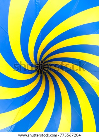 Blue and yellow swirl abstract background