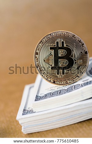 Bitcoin BTC concept. Golden Bitcoin coins as symbol of electronic virtual money