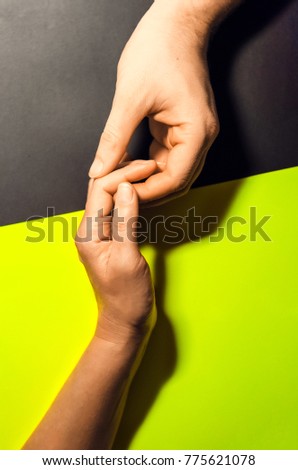 touch of hands. women's and men's hands. gentle hands.