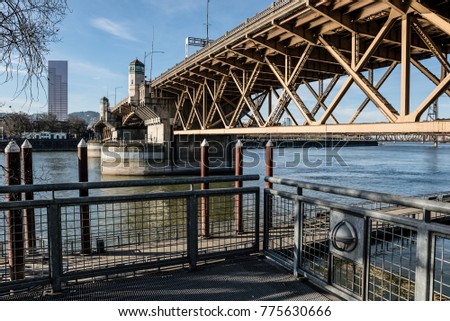 Eastbank Esplanade showing the underside of the Burnside Bridge along the Willamette River in Portland, Oregon December 2017 Royalty-Free Stock Photo #775630666
