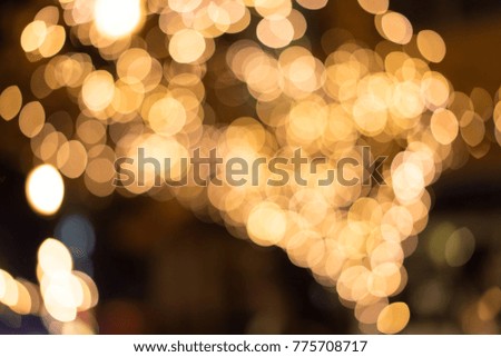 Blurred decoration light on tree in christmas event.