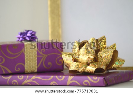 Elegant gift-wrapped box in pretty paper and bow with copy space