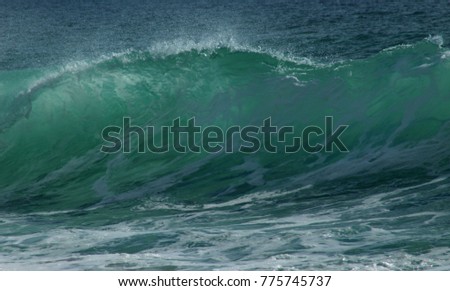 Beautiful turquoise wave, water background picture, sunshine in south of France, splash, drops