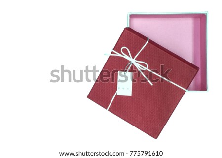 Red open gift box with white bow and cardisolated on white