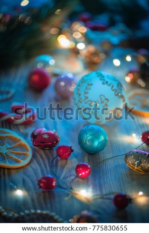 Magic Composition with Christmas decoration and candies on wooden rustic background.