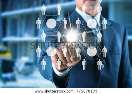 Businessman pressing abstract digital button