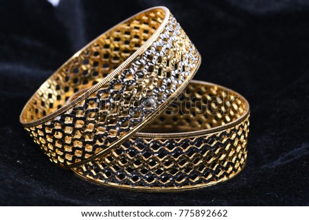 Fancy Gold looking Bracelet with Diamond macro images and black background