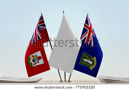 Flags of Bermuda and British Virgin Islands with a white flag in the middle