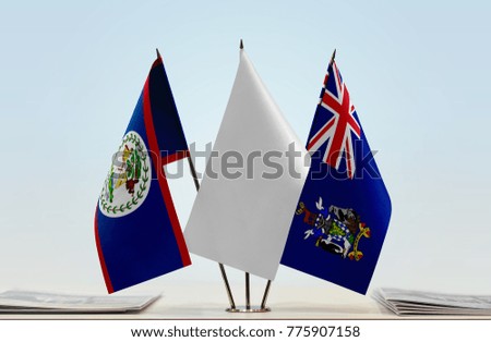Flags of Belize and South Georgia and Sandwich with a white flag in the middle