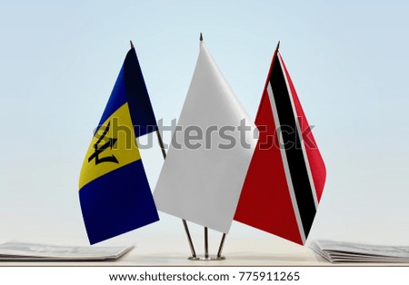 Flags of Barbados and Trinidad and Tobago with a white flag in the middle