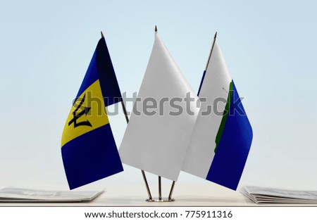 Flags of Barbados and Navassa Island with a white flag in the middle
